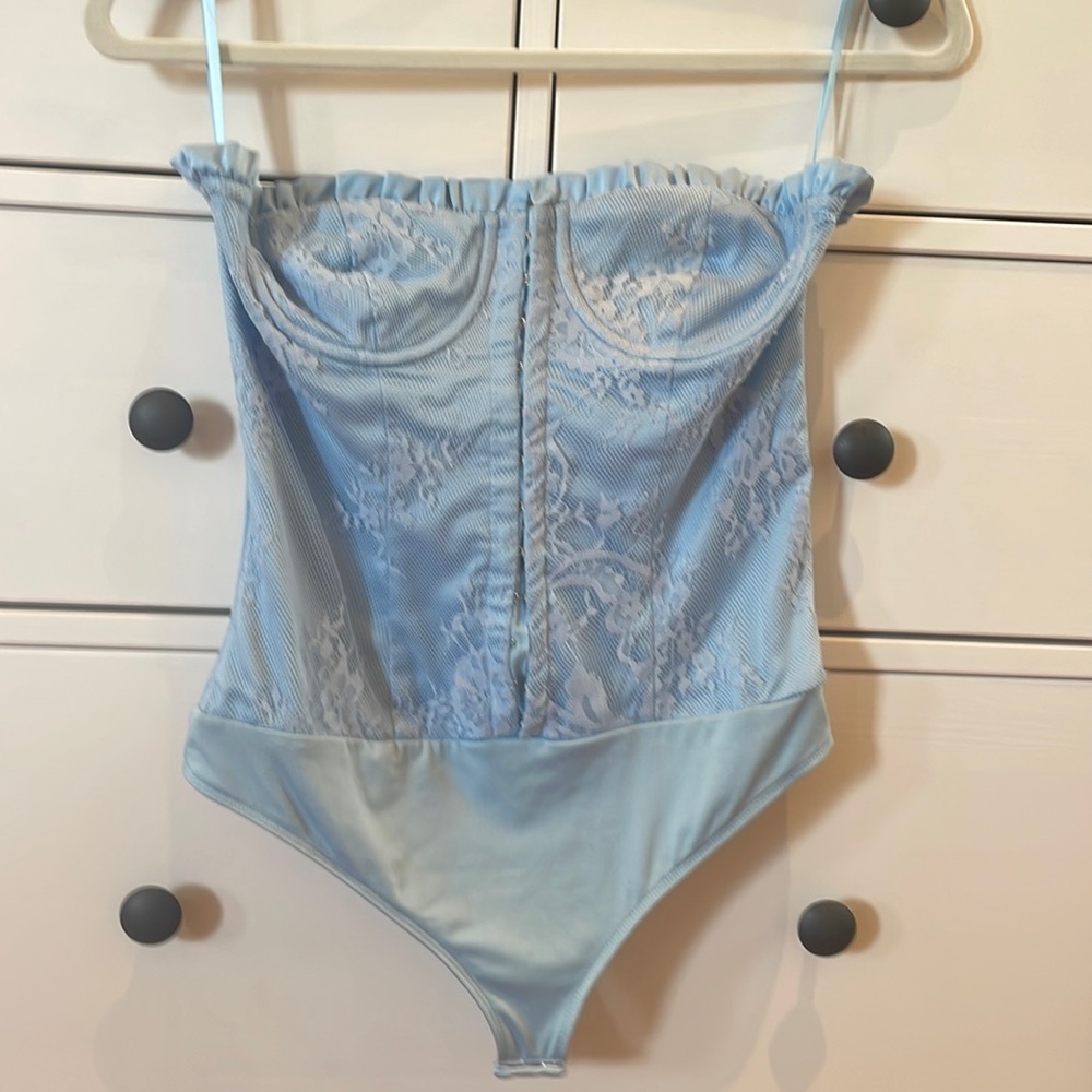 Baby blue Majorelle bodysuit.
